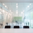 Double glass partition wall with design foil added at townhall Woerden