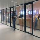 IQ-Pro partitions glass wall with vertical stands and vector design film added