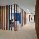 Wood construction on the glass of a office partition
