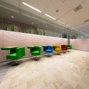 Wood panels added to a single glass partition wall