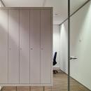 Glass wall with integrated cabinets