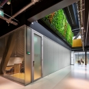 Glass partition walls with enforced door frames.