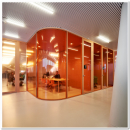 Meeting room with curved glass partition walls of QbiQ 