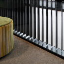 A close up of a partition wall with blinds inside