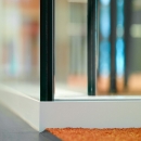 Detail of double glass partition wall 90 degrees corner