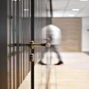 Glass partition wall with flush doors