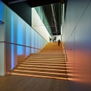 Blue light behind the IQ-Single glass wall at Pulse Delft