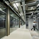 Corridor with glass partition walls of QbiQ