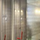 Full glass partitions wall with text design film added