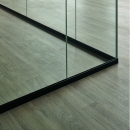 Corner detail from a QQ1 freestanding glass office