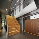 Glass partition with integrated cabinets at Floating Office in Rotterdam.