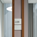 Service panel besides a door