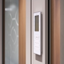 Service panel besides a door
