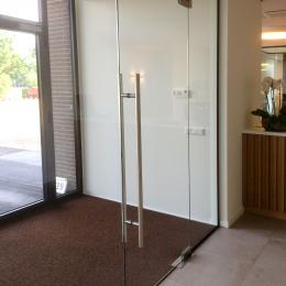enclosed porch with tempered glass door