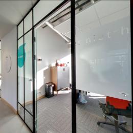 Classic Van Nelle style glass wall with black mullions