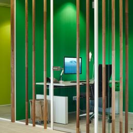 Wood construction on the glass of a office partition