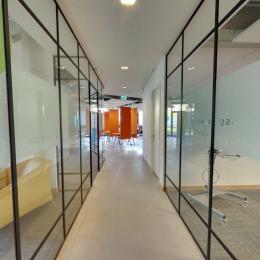 Classic Van Nelle style glass wall with black mullions