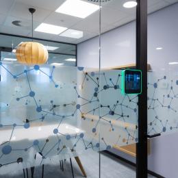 Electronic room reservation system mounted on the door frame