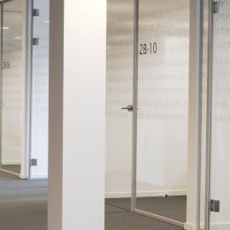Separated offices created with glass partitions walls