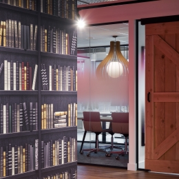 Glass conversation room with barn doors.